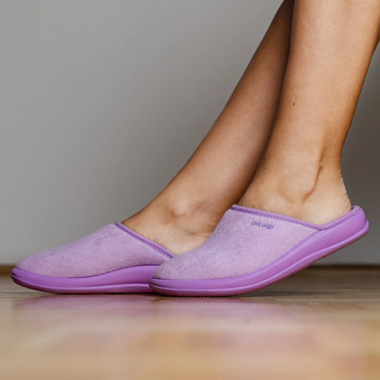 Woman wearing DrLuigi® violet cotton medical slippers, standing view