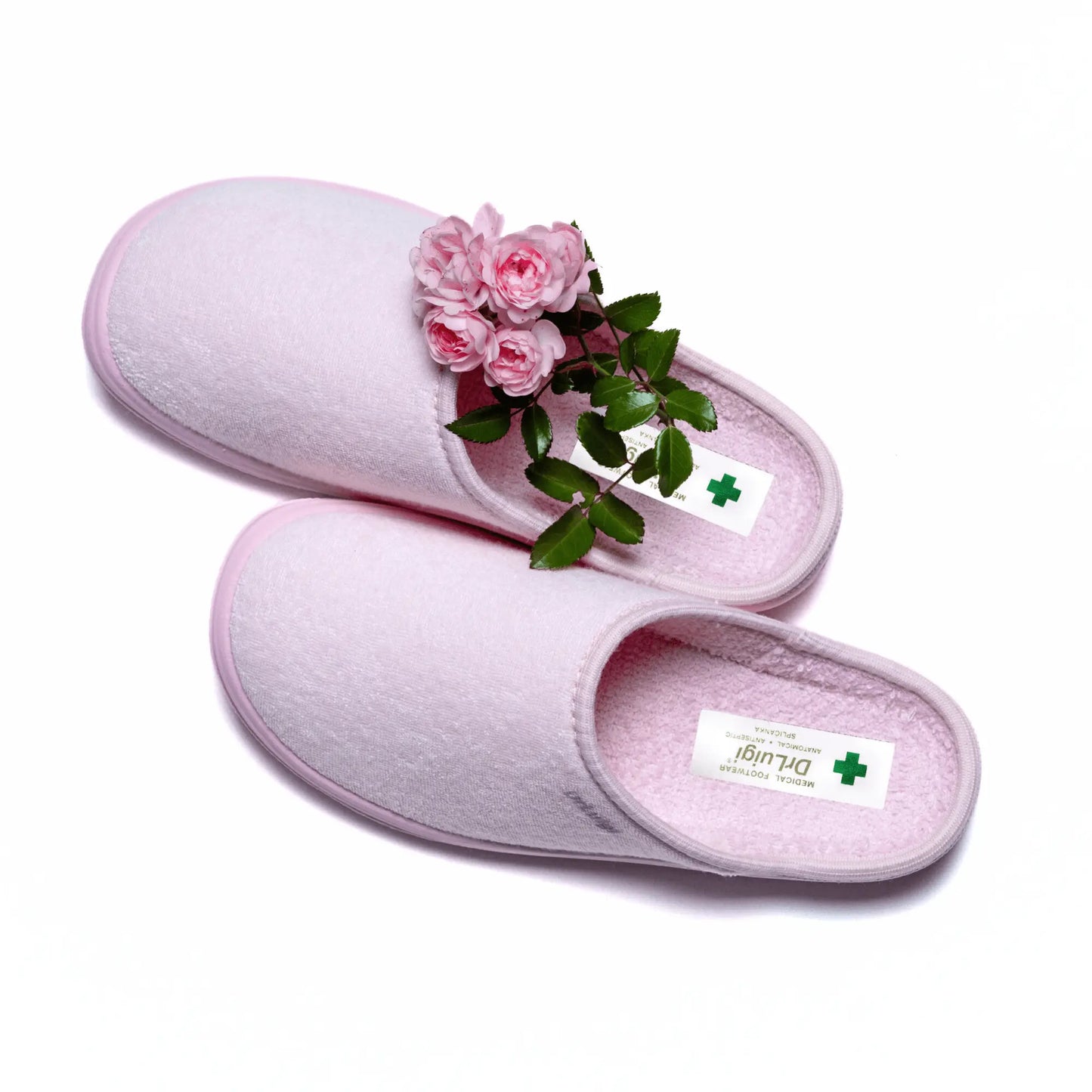 Pair of DrLuigi® pink cotton medical slippers for women, angled view