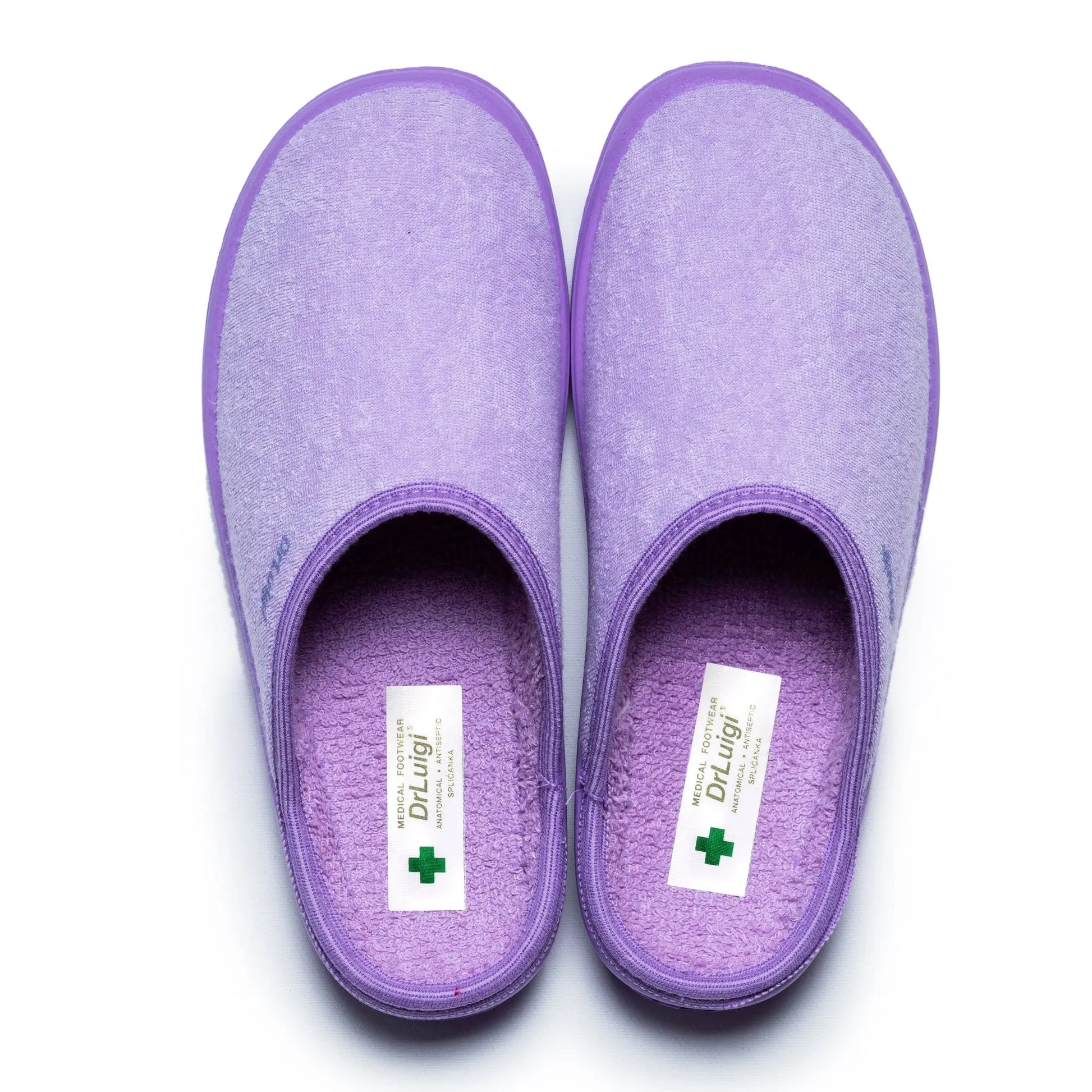 Pair of DrLuigi® violet cotton medical slippers, top view with Medical Footwear insole label