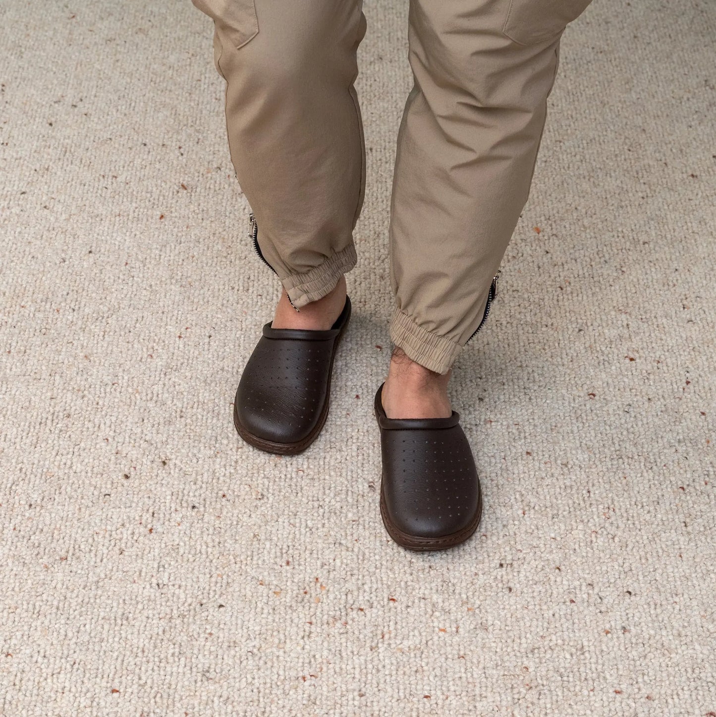 Man wearing DrLuigi® brown leather orthopedic clogs, standing view